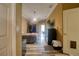 This large main bedroom features an outside entry, hard flooring and a ceiling fan at 3234 Morven Dr, Spring Hill, FL 34609