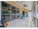 This screen patio allows for relaxing outside without the bugs at 3234 Morven Dr, Spring Hill, FL 34609