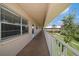 Open-air exterior walkway with a view of the community and building details at 10038 62Nd N Ter # 17, St Petersburg, FL 33708