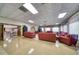 Large lounge area with multiple seating options and a bright, airy feel at 10038 62Nd N Ter # 17, St Petersburg, FL 33708