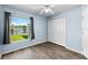 Bright bedroom with pond view, ceiling fan and closet at 10205 Charleston Corner Rd, Tampa, FL 33635