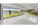 Enjoy the peaceful lake view from this bright enclosed lanai with tile flooring at 10205 Charleston Corner Rd, Tampa, FL 33635