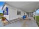 Covered carport area with room for parking at 104 E Saint Johns Way, Apollo Beach, FL 33572