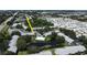 Aerial view of the community showcasing the pool, pond, and surrounding greenery at 11201 122Nd Ave # 167, Largo, FL 33778