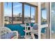 Enclosed balcony featuring comfortable seating with neighborhood views at 11201 122Nd Ave # 167, Largo, FL 33778