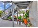 Cozy entrance area featuring a staircase, lush plants, and decorative accents for added charm at 11201 122Nd Ave # 167, Largo, FL 33778