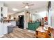 Bright kitchen with white cabinets, black appliances and lots of natural light at 11201 122Nd Ave # 167, Largo, FL 33778