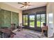 Sunroom with glass doors leading to the backyard at 11201 122Nd Ave # 167, Largo, FL 33778
