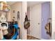 Laundry area features a blue washer, shelving, and a towel rack for convenience at 11201 122Nd Ave # 167, Largo, FL 33778