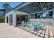 Outdoor pool features shaded seating and a paved patio area at 11201 122Nd Ave # 167, Largo, FL 33778