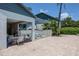 Relaxing pool area has seating, mature landscaping, and shade at 11201 122Nd Ave # 167, Largo, FL 33778