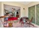 Cozy sun room with glass sliding doors, leads into living area at 11201 122Nd Ave # 167, Largo, FL 33778