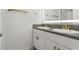 Elegant bathroom featuring double sinks, granite countertops, and modern gold fixtures at 11508 Sage Canyon Dr, Riverview, FL 33578