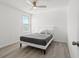 Inviting bedroom with wood floors and a ceiling fan at 11508 Sage Canyon Dr, Riverview, FL 33578