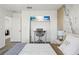 Bright bedroom features a built-in desk and ample closet space at 11508 Sage Canyon Dr, Riverview, FL 33578