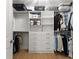 Walk-in closet with ample storage space and organized shelving at 11508 Sage Canyon Dr, Riverview, FL 33578