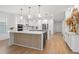 Spacious kitchen boasts modern appliances, sleek countertops, ample cabinet space, and a functional center island at 11508 Sage Canyon Dr, Riverview, FL 33578