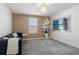 A naturally lit living room with modern furnishings, wood-look floors, and decorative wall accents at 11508 Sage Canyon Dr, Riverview, FL 33578