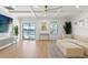 Open living space with access to the backyard patio overlooking the water at 11508 Sage Canyon Dr, Riverview, FL 33578