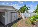 View of the backyard featuring a utility shed for storing gardening tools and equipment at 11746 93Rd Ave, Seminole, FL 33772