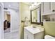 Bathroom featuring a vanity with mirror and modern fixtures at 11746 93Rd Ave, Seminole, FL 33772