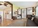 Inviting living room with open layout, hardwood floors, and a seamless flow into the kitchen at 11746 93Rd Ave, Seminole, FL 33772