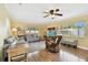 Cozy living room with neutral paint and lots of natural light at 11746 93Rd Ave, Seminole, FL 33772