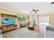 Spacious living room with large windows and neutral colored walls at 11746 93Rd Ave, Seminole, FL 33772