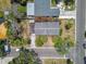 Overhead view of a house with a gray roof, a small deck, and modest landscaping at 123 14Th Ave, Indian Rocks Beach, FL 33785