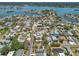Picturesque aerial view of a waterfront community with stunning canals and lush greenery at 123 14Th Ave, Indian Rocks Beach, FL 33785