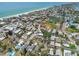 This aerial view of a residential area near the beach captures the community's layout at 123 14Th Ave, Indian Rocks Beach, FL 33785