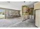 View of the kitchen with open floor plan, vintage cabinets, and natural light ready for upgrades at 123 14Th Ave, Indian Rocks Beach, FL 33785