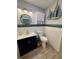 Stylishly renovated bathroom with granite counters and decorative tile at 12300 4Th E St, Treasure Island, FL 33706