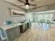Bright dining area with a bar and a view of the outdoor pool and canal at 12300 4Th E St, Treasure Island, FL 33706