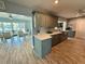Kitchen and dining room combination with lots of windows, light and views of the backyard canal at 12300 4Th E St, Treasure Island, FL 33706