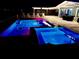 Backyard retreat with an in-ground pool, spa, and plenty of space for entertaining under the open sky at 12300 4Th E St, Treasure Island, FL 33706