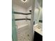 Step-in shower with decorative tile and corner bench at 12300 4Th E St, Treasure Island, FL 33706