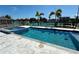 Beautiful backyard with pool and hot tub, overlooking serene water views and boat dock at 12300 4Th E St, Treasure Island, FL 33706
