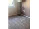 Cozy bedroom with plush carpeting, soft lighting, and a decorative shelving unit at 12801 Winding Way, Hudson, FL 34667