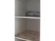 Well-organized closet featuring ample shelving, providing plenty of storage space at 12801 Winding Way, Hudson, FL 34667
