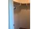 A clean and functional closet with hanging rod and shelving at 12801 Winding Way, Hudson, FL 34667