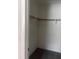Functional closet featuring a clothing rod and shelves, optimizing storage and organization at 12801 Winding Way, Hudson, FL 34667