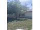 Charming single-Gathering home with a well-maintained lawn and mature trees at 12801 Winding Way, Hudson, FL 34667