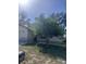 Traditional single-story home featuring an attached garage and a well-kept lawn at 12801 Winding Way, Hudson, FL 34667