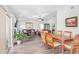 Spacious living and dining areas with wood floors, comfortable seating, and ample natural light at 12910 Leadwood Dr, Riverview, FL 33579