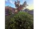 View of the property's backyard showcasing lush landscaping and mature trees at 13133 Roseanna Dr, Spring Hill, FL 34609