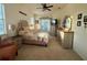 Well-lit bedroom with elegant decor and an exterior view of the screened-in porch at 13133 Roseanna Dr, Spring Hill, FL 34609
