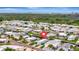 An aerial view of a waterfront residential community with access to the canals and open water at 134 W Saint Annes Cir, Apollo Beach, FL 33572