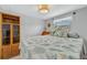 A cozy bedroom with nautical themed decor and soft natural light at 134 W Saint Annes Cir, Apollo Beach, FL 33572