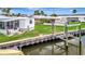 This waterfront property includes a boat lift and space for outdoor enjoyment at 134 W Saint Annes Cir, Apollo Beach, FL 33572
